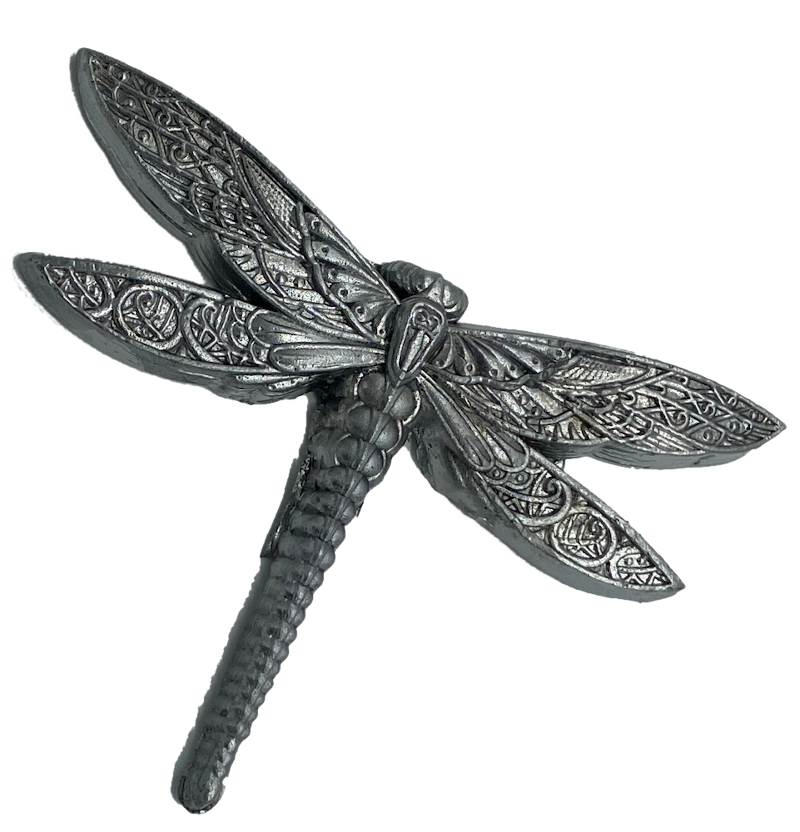 photo of a lead dragonfly motif on a transparent background